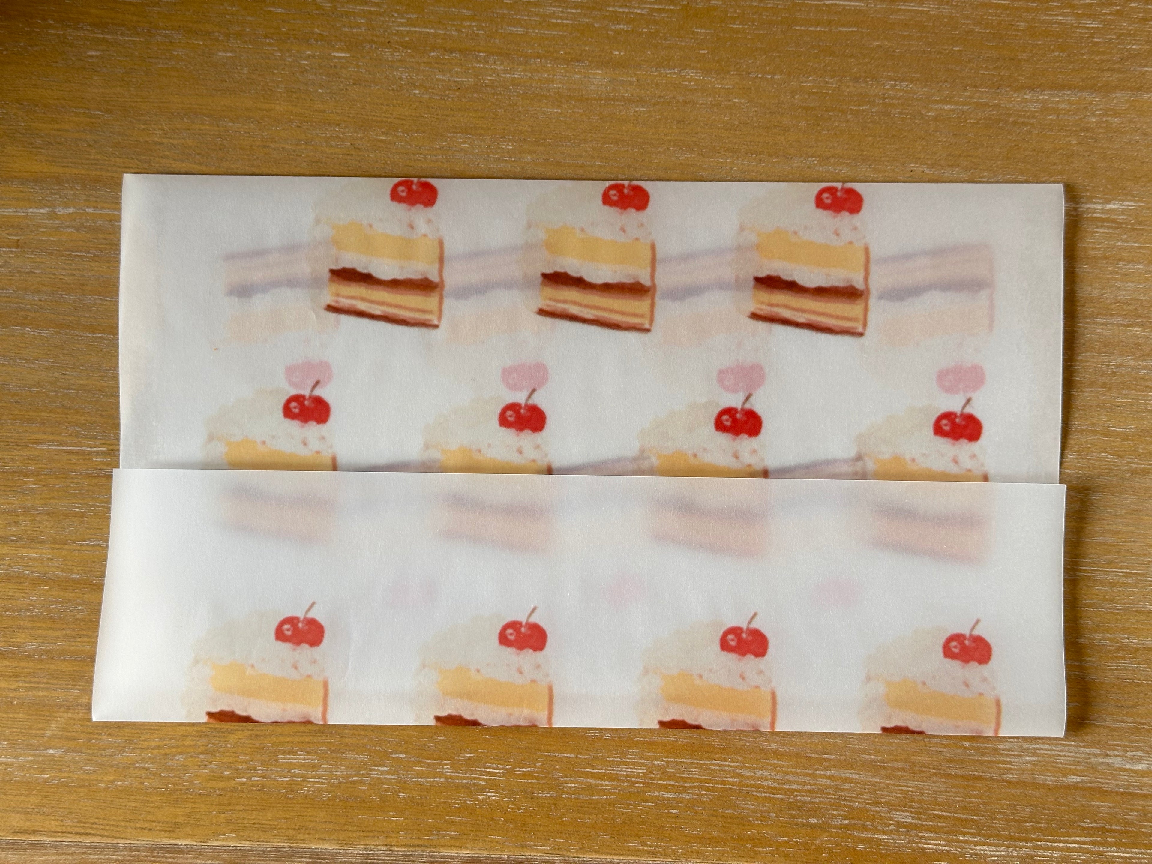 envelope: cream cake with cherry